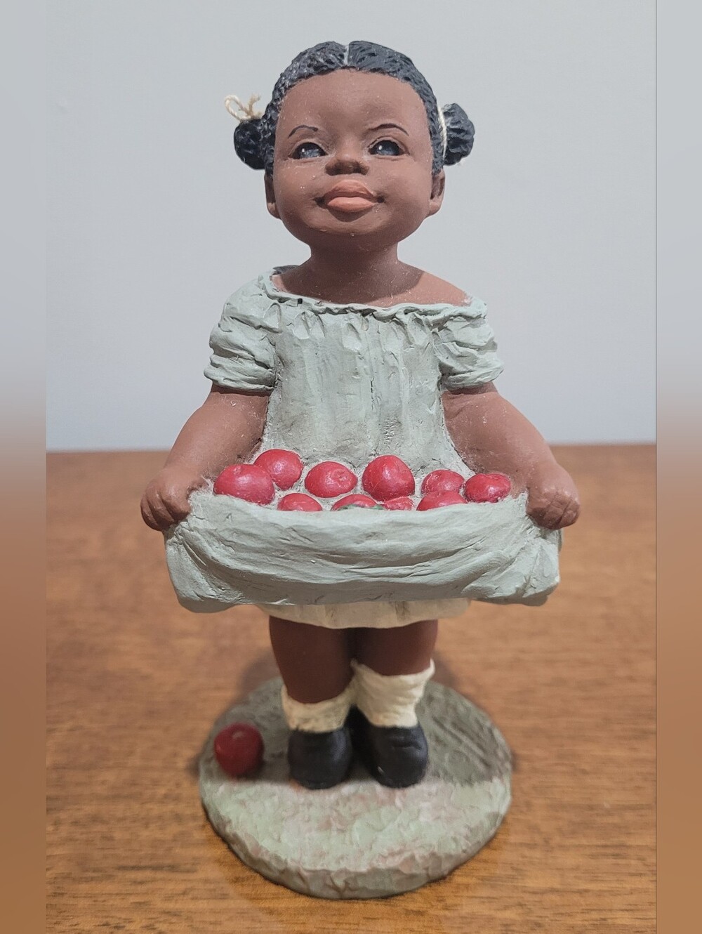 Vintage All God's Children Figurine, Tara. Holding Apples With Her Dress